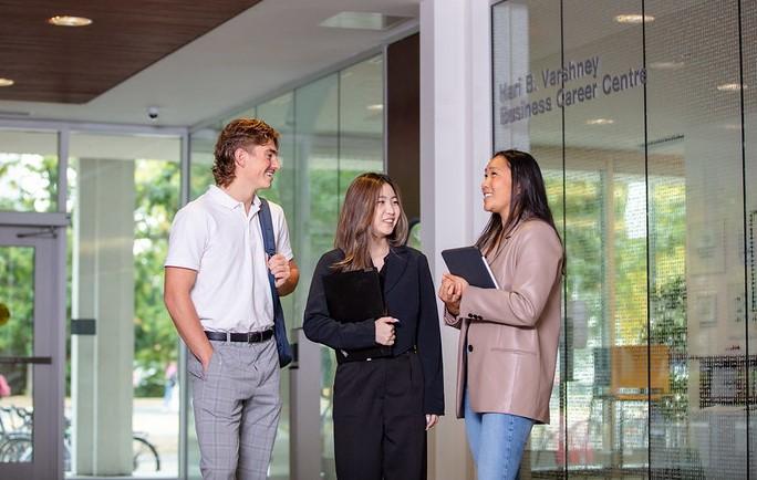 3 students in front of the BCC